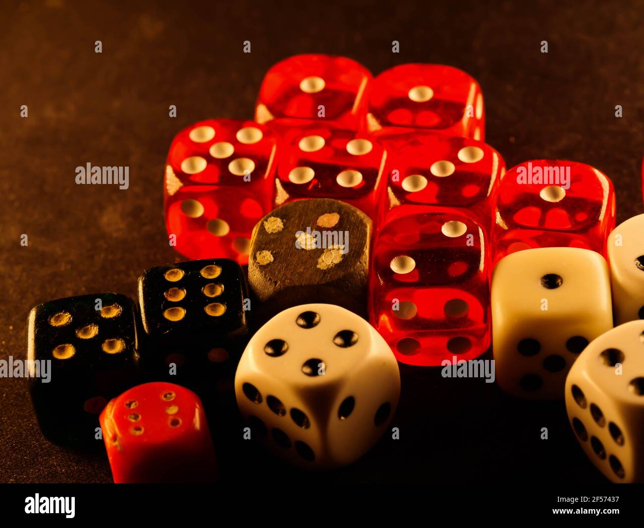 Creative background, roulette, gaming dice, cards, casino chips on a dark background. The concept of gambling, casino, winnings, Vegas Games Backgroun Stock Photo