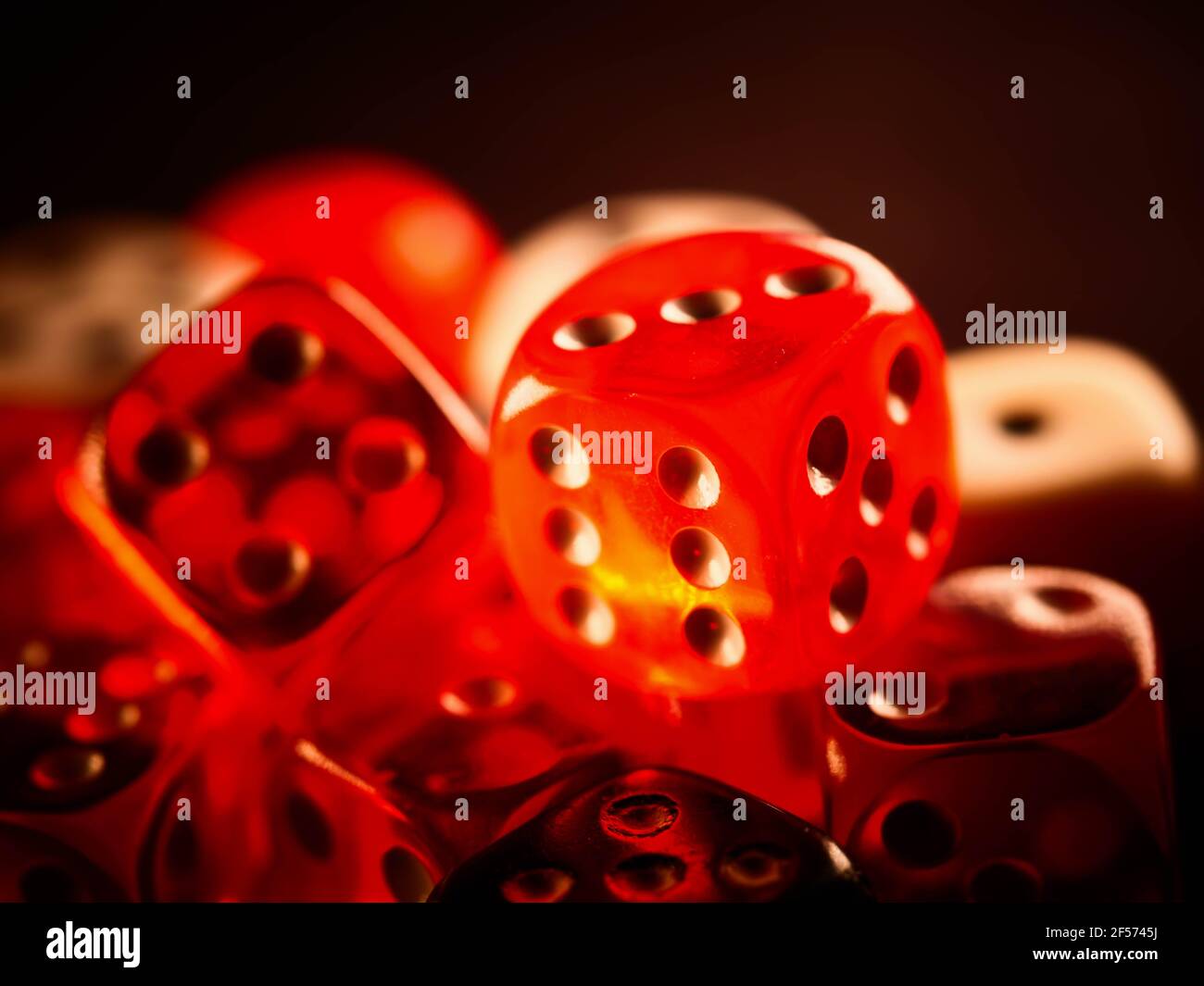 Creative background, roulette, gaming dice, cards, casino chips on a dark background. The concept of gambling, casino, winnings, Vegas Games Backgroun Stock Photo