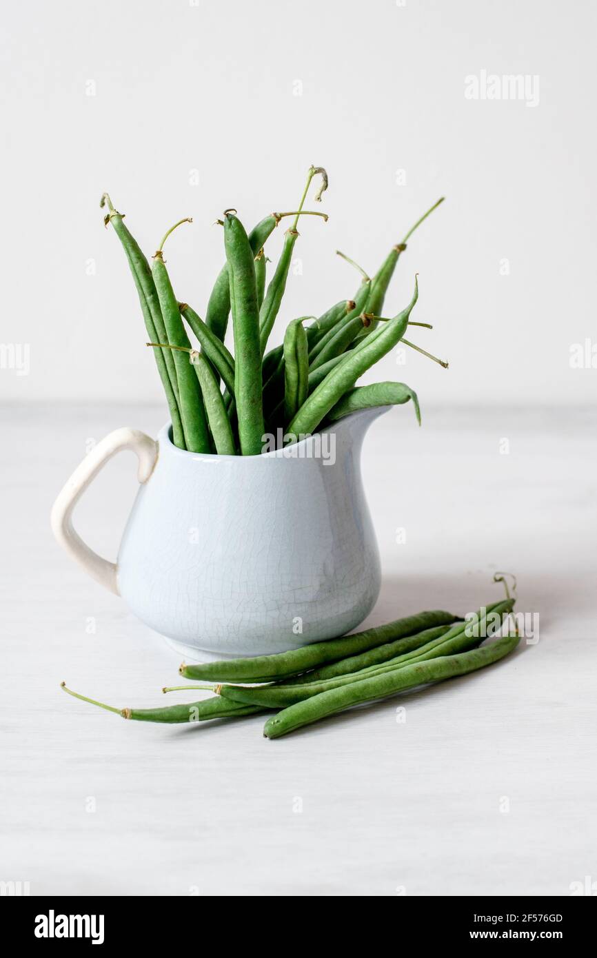 Organic French Beans against a simple plain background Stock Photo