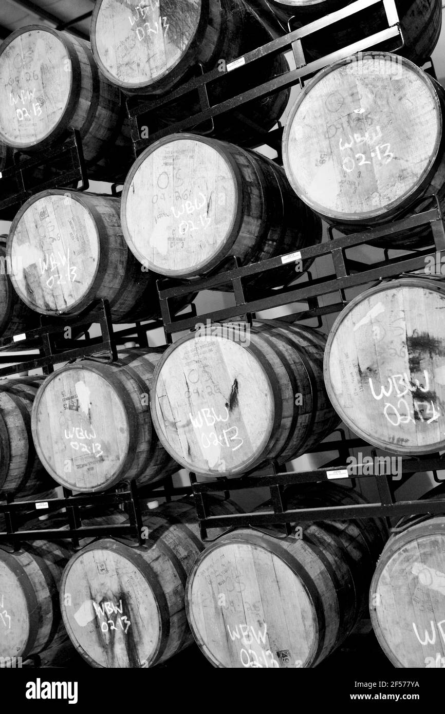 Beer aging in wooden oak barrels casks on rack in warehouse at River Horse Brewing Co., 2 Graphics Drive, Ewing, NJ, USA Stock Photo
