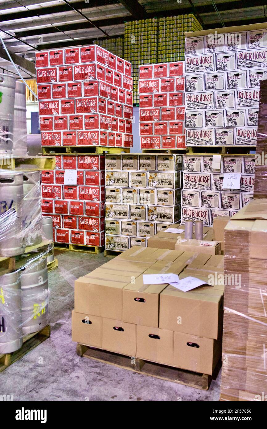 Stacks of cases of beer in the factory at River Horse Brewery Co. in Ewing, NJ, USA Stock Photo