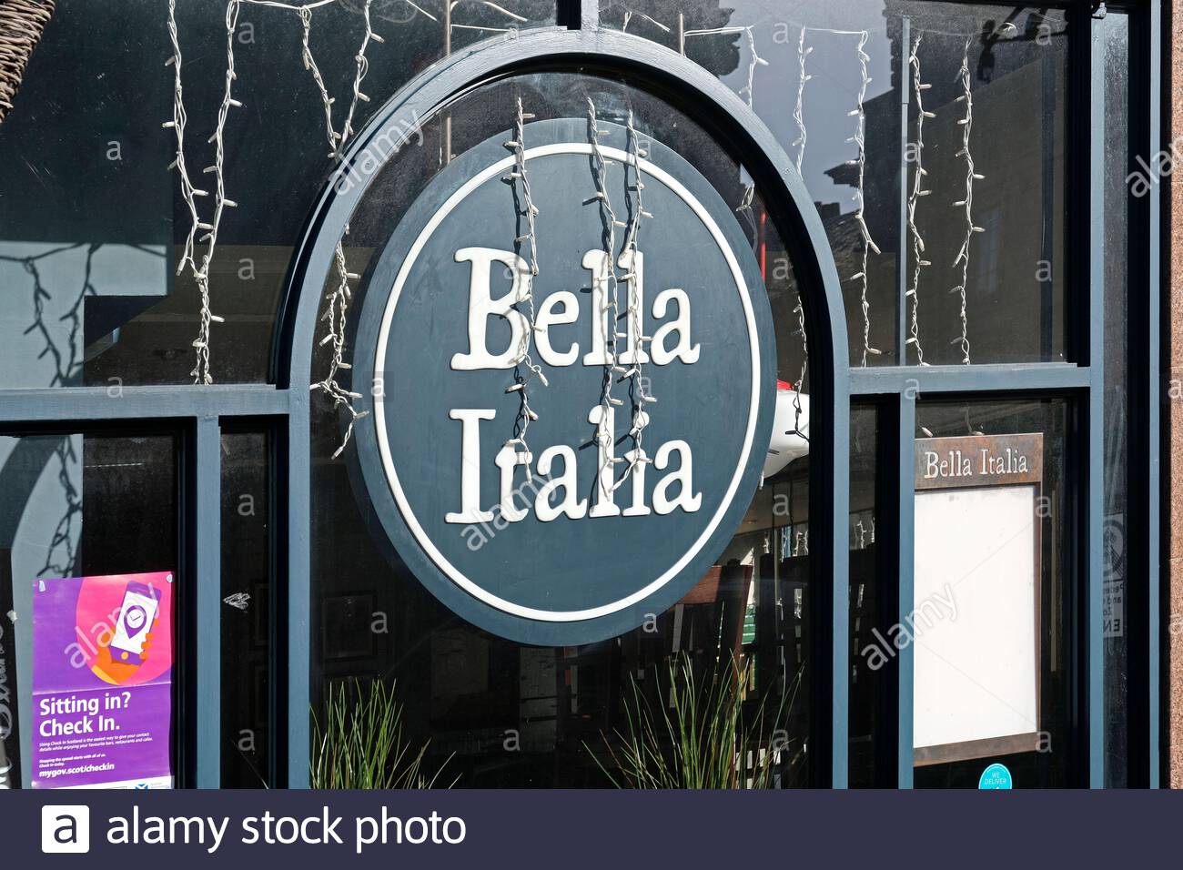 Bella Italia Italian pizzeria and restaurant sign, Royal Mile, Edinburgh, Scotland Stock Photo
