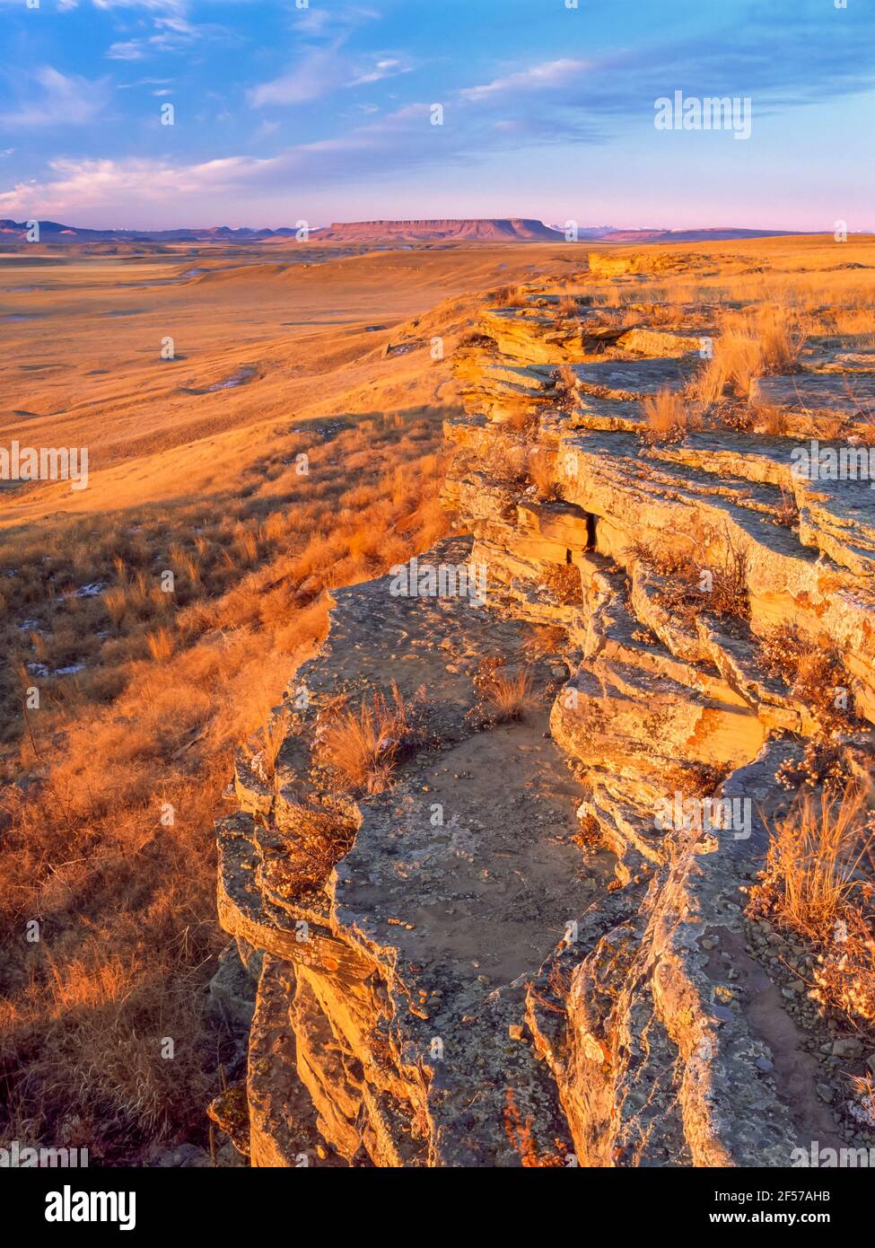 morning light on cliffs of first peoples buffalo jump state park (formerly ulm pishkun) near ulm
