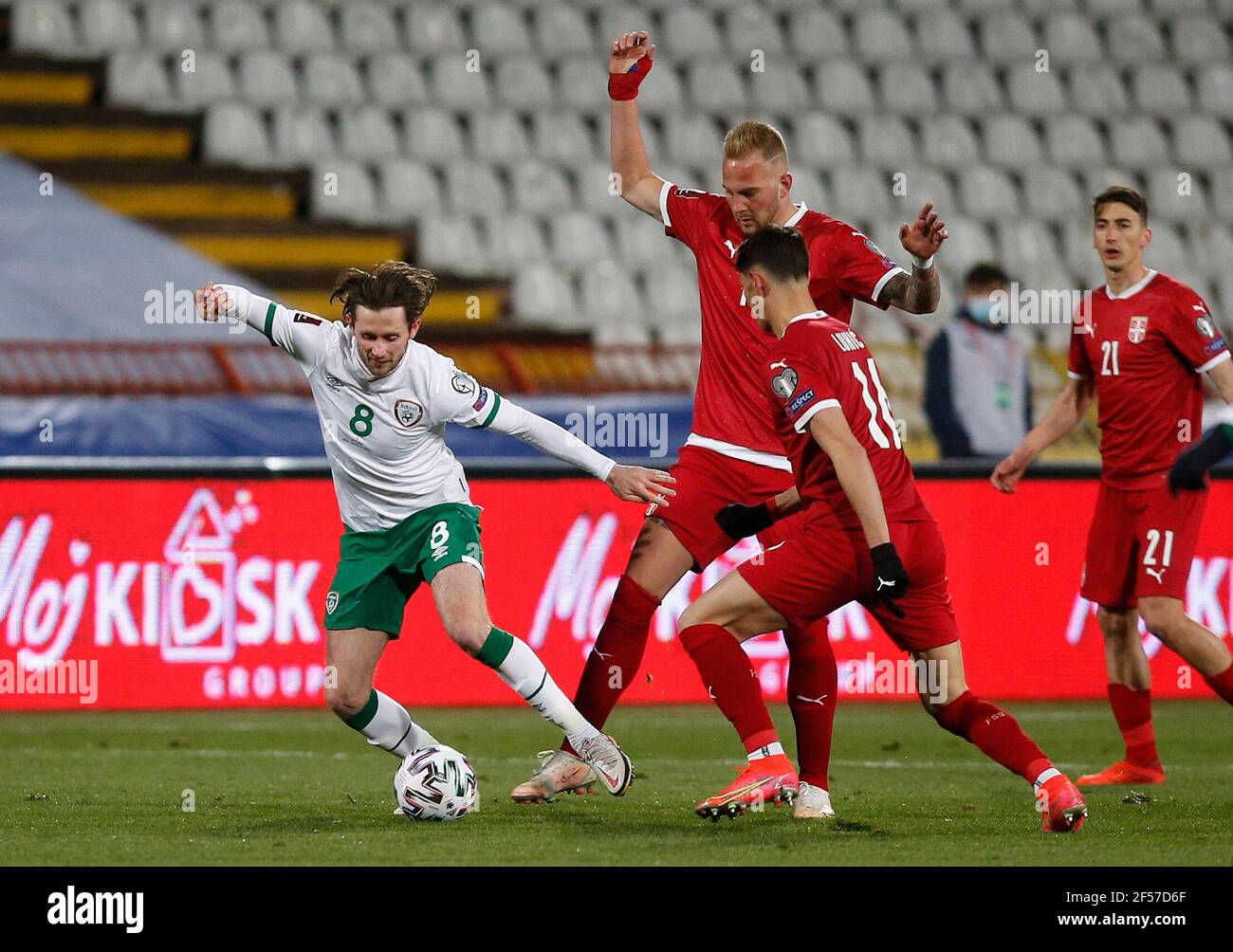 Republic of Ireland's Alan Browne (left) in action with Serbia's Uros Racic (centre) and Sasa Lukic during the 2022 FIFA World Cup Qualifying match at the Rajko Mitic Stadium in Belgrade, Serbia. Picture date: Wednesday March 24, 2021. Stock Photo