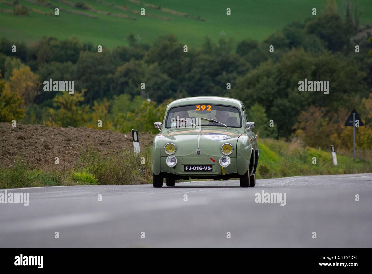 CAGLI , ITALY - OTT 24 - 2020 : RENAULT DAUPHINE 1957 on an old racing car in rally Mille Miglia 2020 the famous italian historical race (1927-1957 Stock Photo