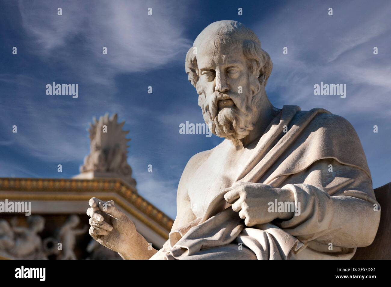 classic statue of greek philosopher Plato close up under blue sky with clouds Stock Photo