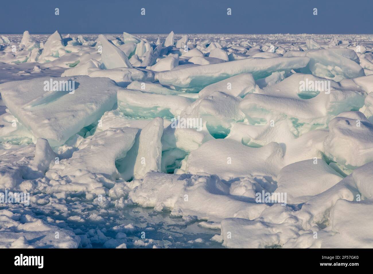 Ice build-up, Straits of Mackinac, between Lake Michigan and Lake Huron, Michigan, USA, February, by James D Coppinger/Dembinsky Photo Assoc Stock Photo