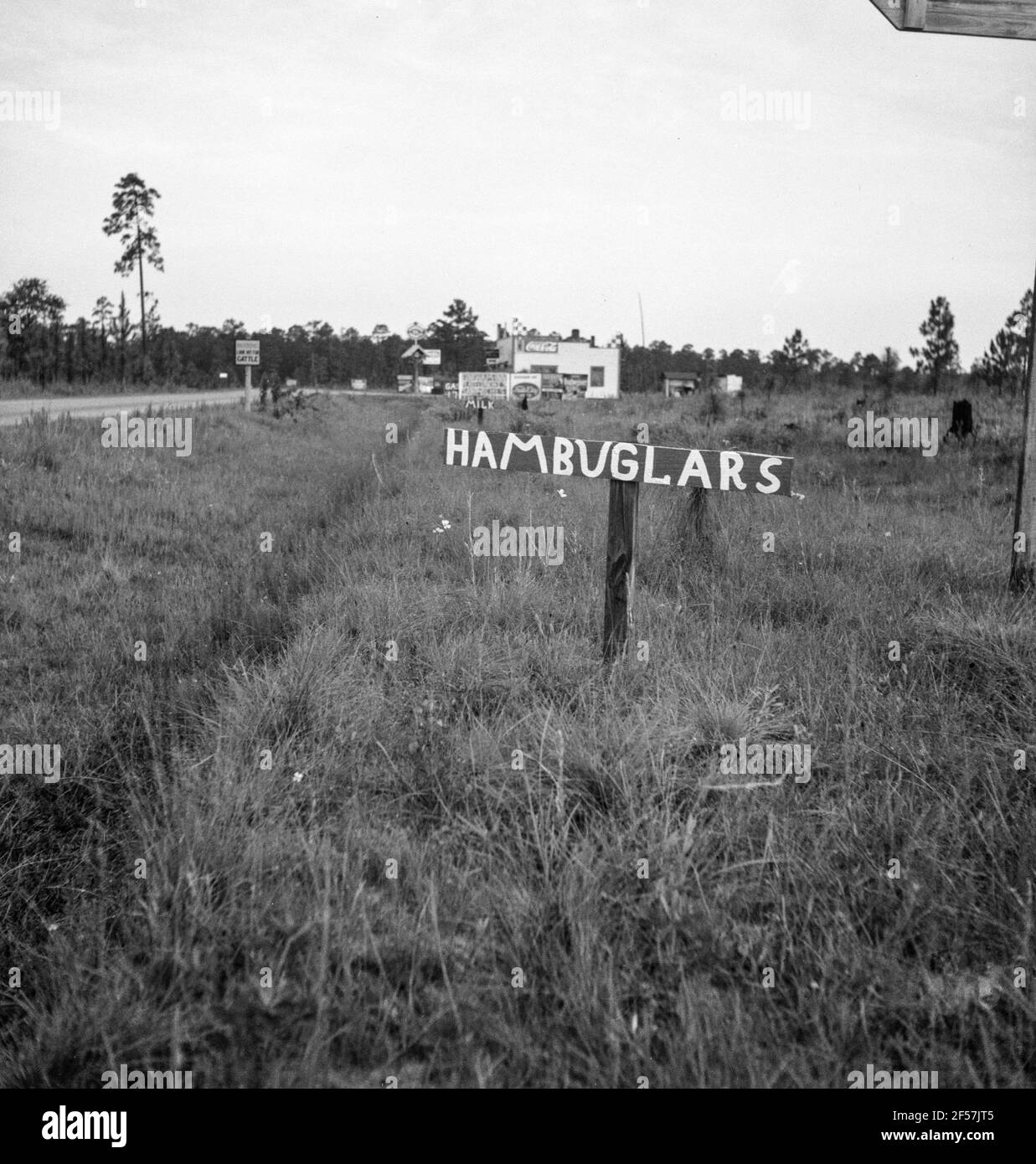 “ Hambuglars “ Georgia road sign. July 1937.  Photograph by Dorothea Lange. Stock Photo