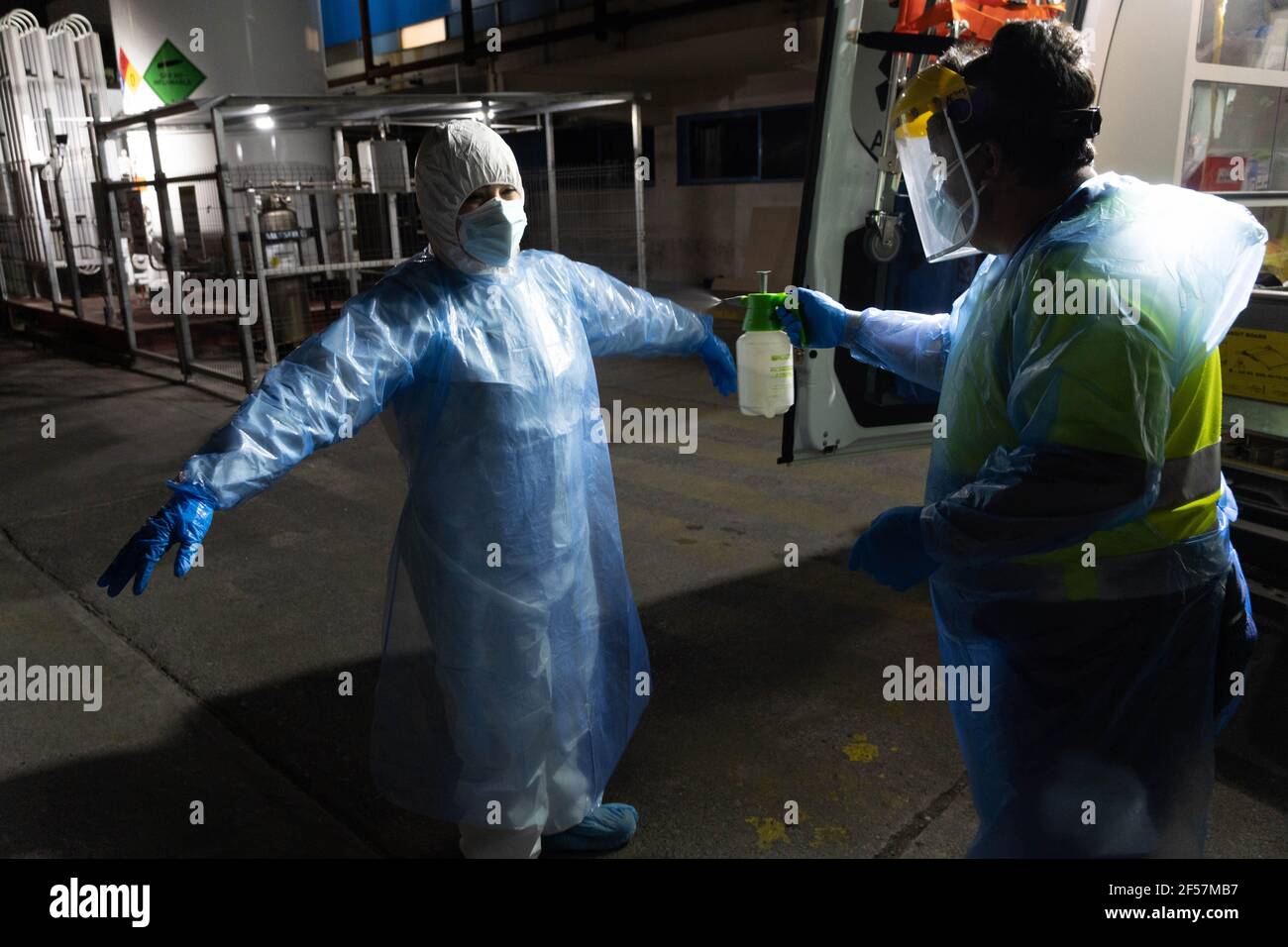 Santiago, Metropolitana, Chile. 24th Mar, 2021. SAMU health personnel are disinfected after transferring a covid-positive and intubated patient to the Metropolitan Hospital in Santiago, Chile. Credit: Matias Basualdo/ZUMA Wire/Alamy Live News Stock Photo