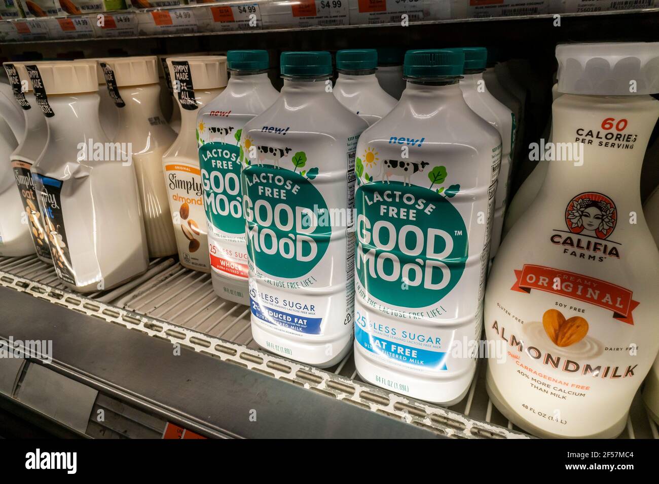 Containers of Coca-Cola's Good Moo’d premium lactose free 'supermilk' in a supermarket in New York on Thursday, March 11, 2021. The premium beverage is lactose-free and contains 25% less sugar than regular lactose-free milk. Coca-Cola was in partnership with Select Milk Producers, maker of Fairlife from its inception in 2012 and acquired the company 2020. It also costs about twice as much as regular milk. (© Richard B. Levine) Stock Photo