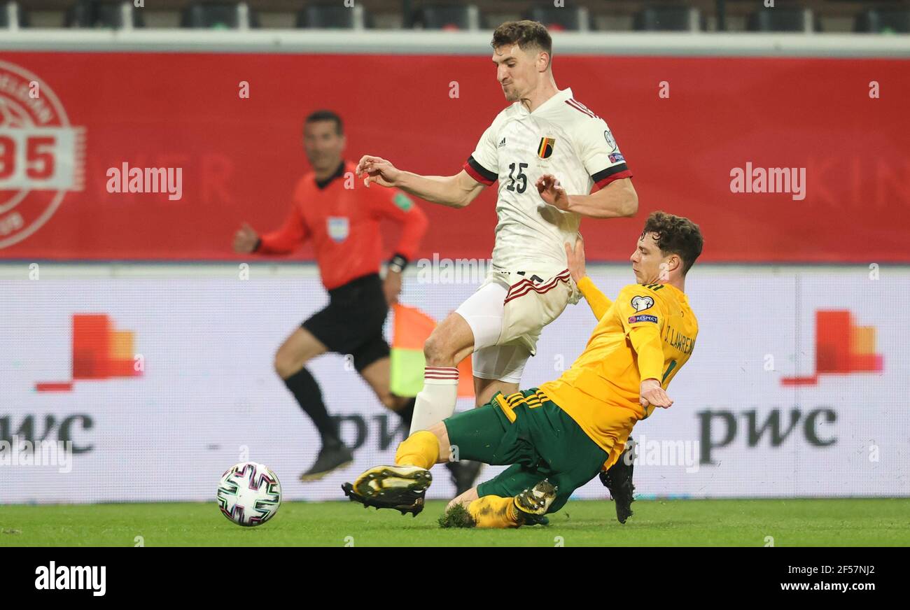Belgium's Thomas Meunier and Welsh James Lawrence fight for the ball during a qualification game for the World Cup 2022 in the group E between the Bel Stock Photo