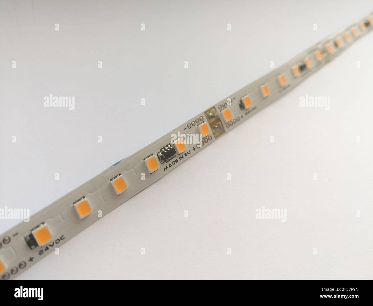 Flexible light emitting diode LED strip for various lighting installation as mood light isolated on the white background Stock Photo