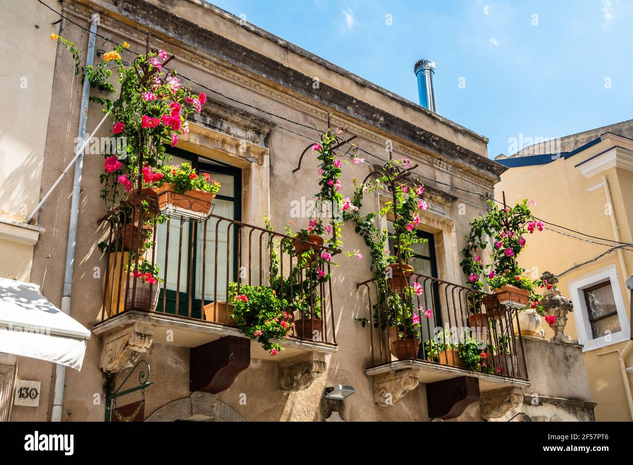 Typical Sicilian balcony of historical buildings in the city centre of ...