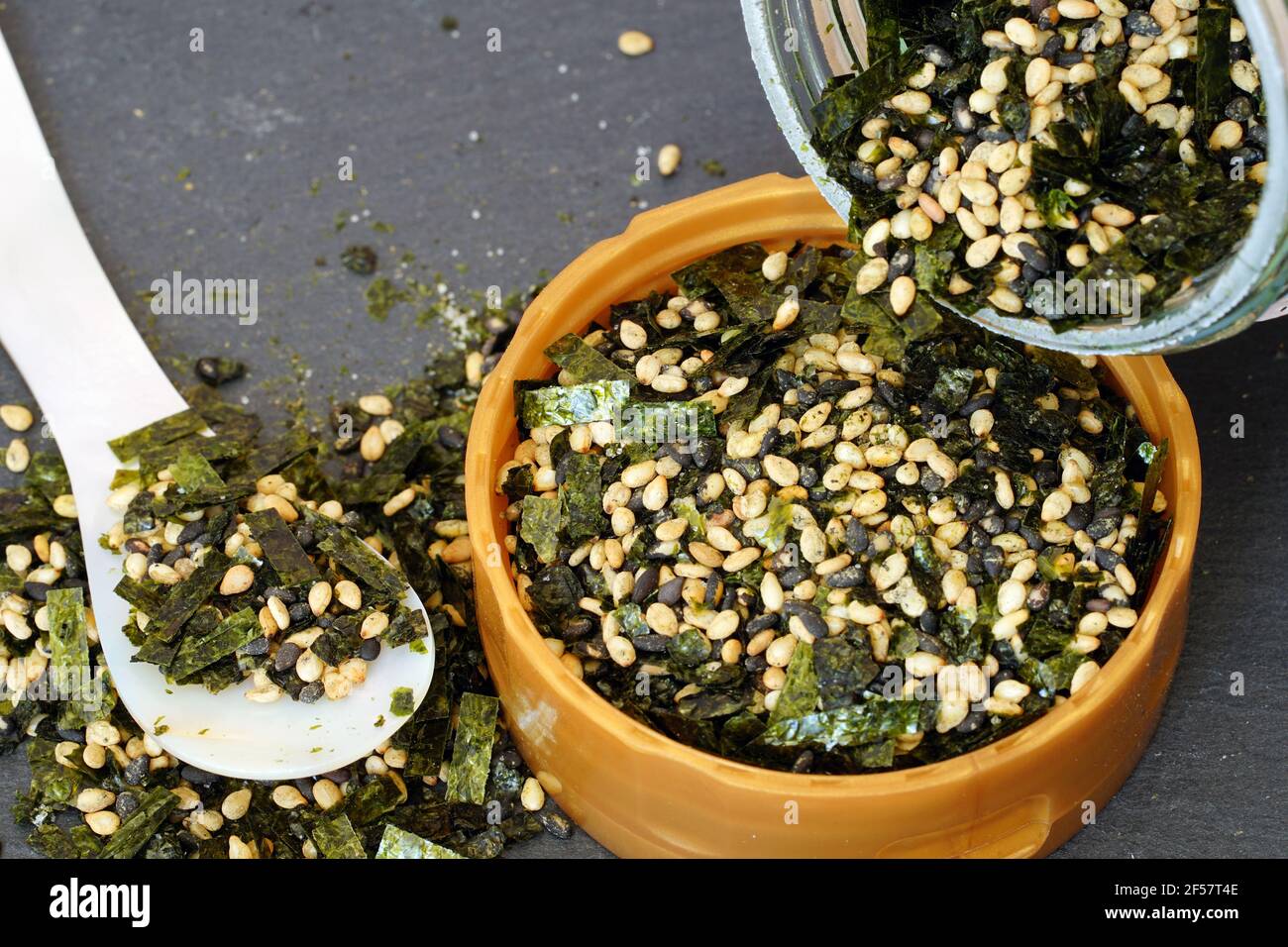 A jar of furikake, a Japanese condiment with dried nori seaweed and