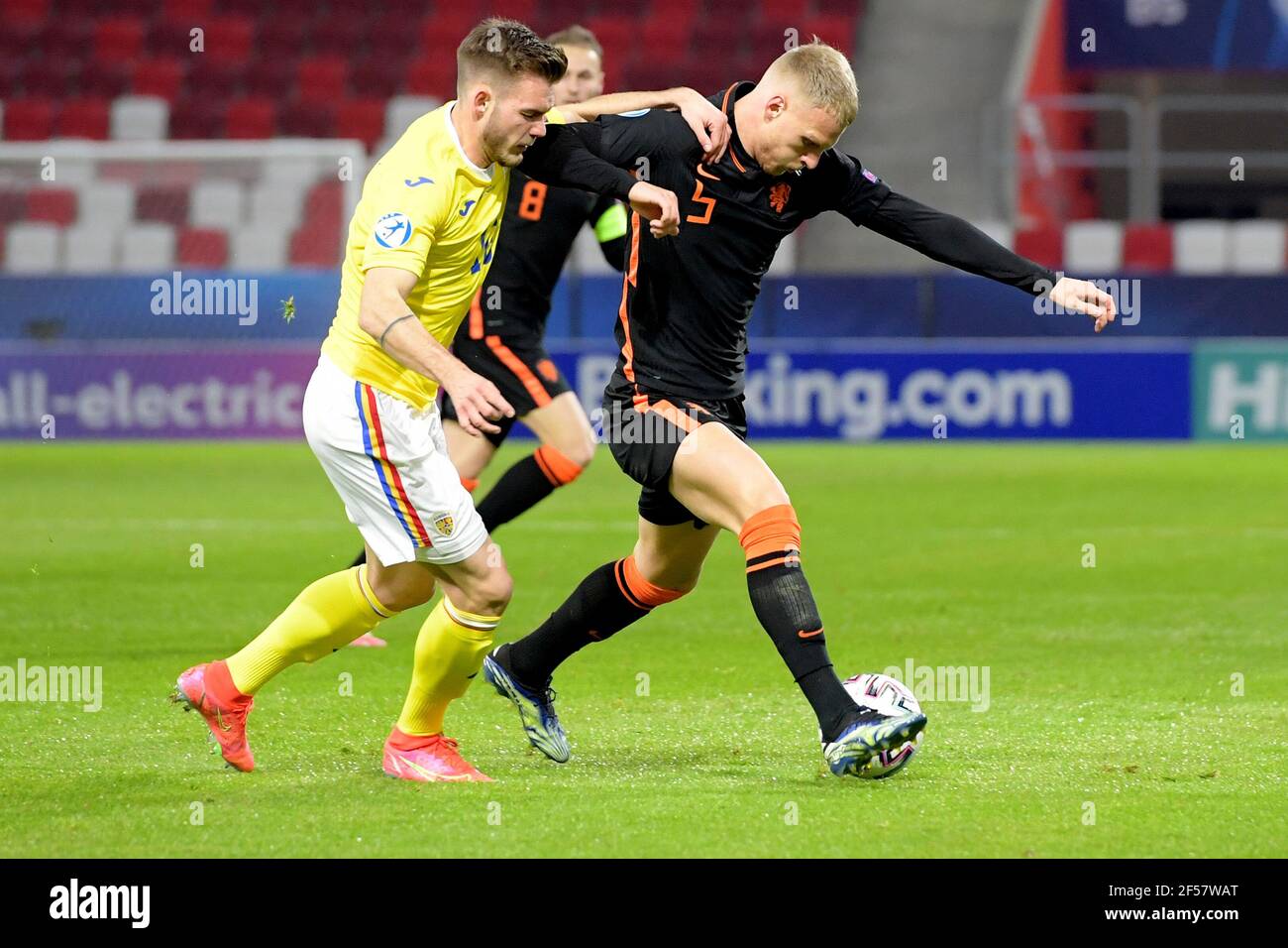 Boedapest Hungary March 24 Denis Harut Of Romania U21 Mitchel Bakker Of The Netherlands U21 During The Uefa Under 21 Euro Championship Group Stag Stock Photo Alamy