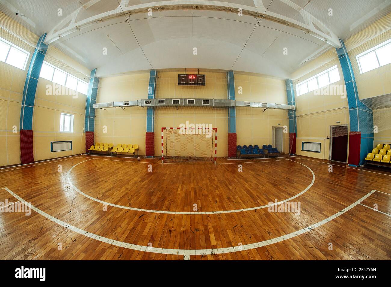 colored stands for fans in an indoor stadium. seats in the sports hall