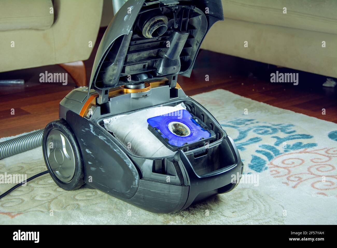 Replacement the dust bag in the vacuum cleaner Stock Photo Alamy
