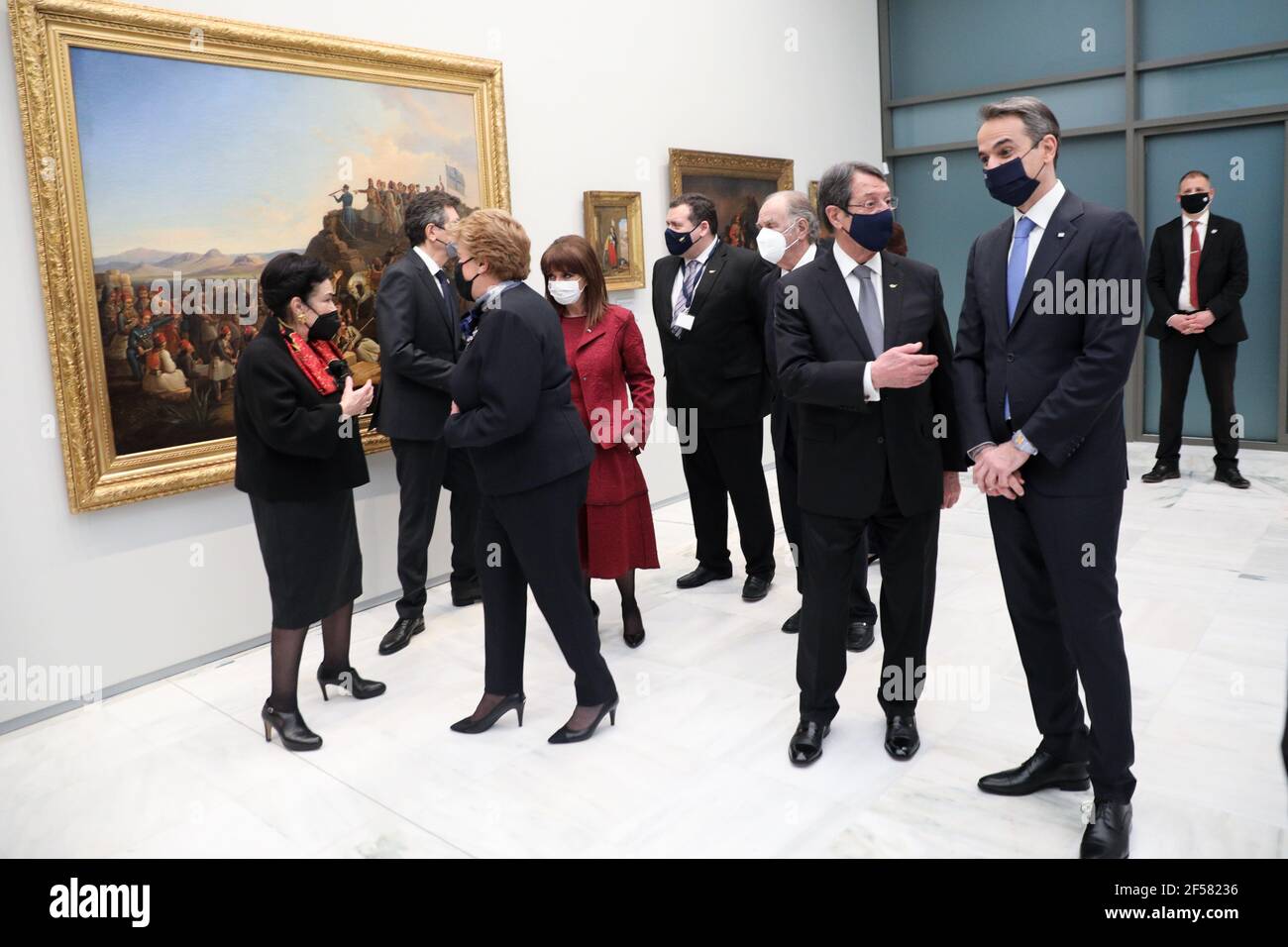 (210324) -- ATHENS, March 24, 2021 (Xinhua) -- Greek Prime Minister Kyriakos Mitsotakis (1st R, Front) and Cypriot President Nicos Anastasiades (2nd R, Front) tour the renovated National Gallery in Athens, Greece, on March 24, 2021. Greece's renovated National Gallery in Athens reopened on Wednesday in time for the 200th anniversary of the start of the Greek War of Independence against Ottoman rule, which will be celebrated on Thursday. (Pool via Xinhua) Stock Photo