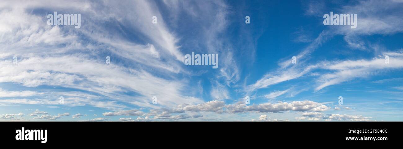 Blue sky with white clouds in a beautiful summer day Stock Photo - Alamy