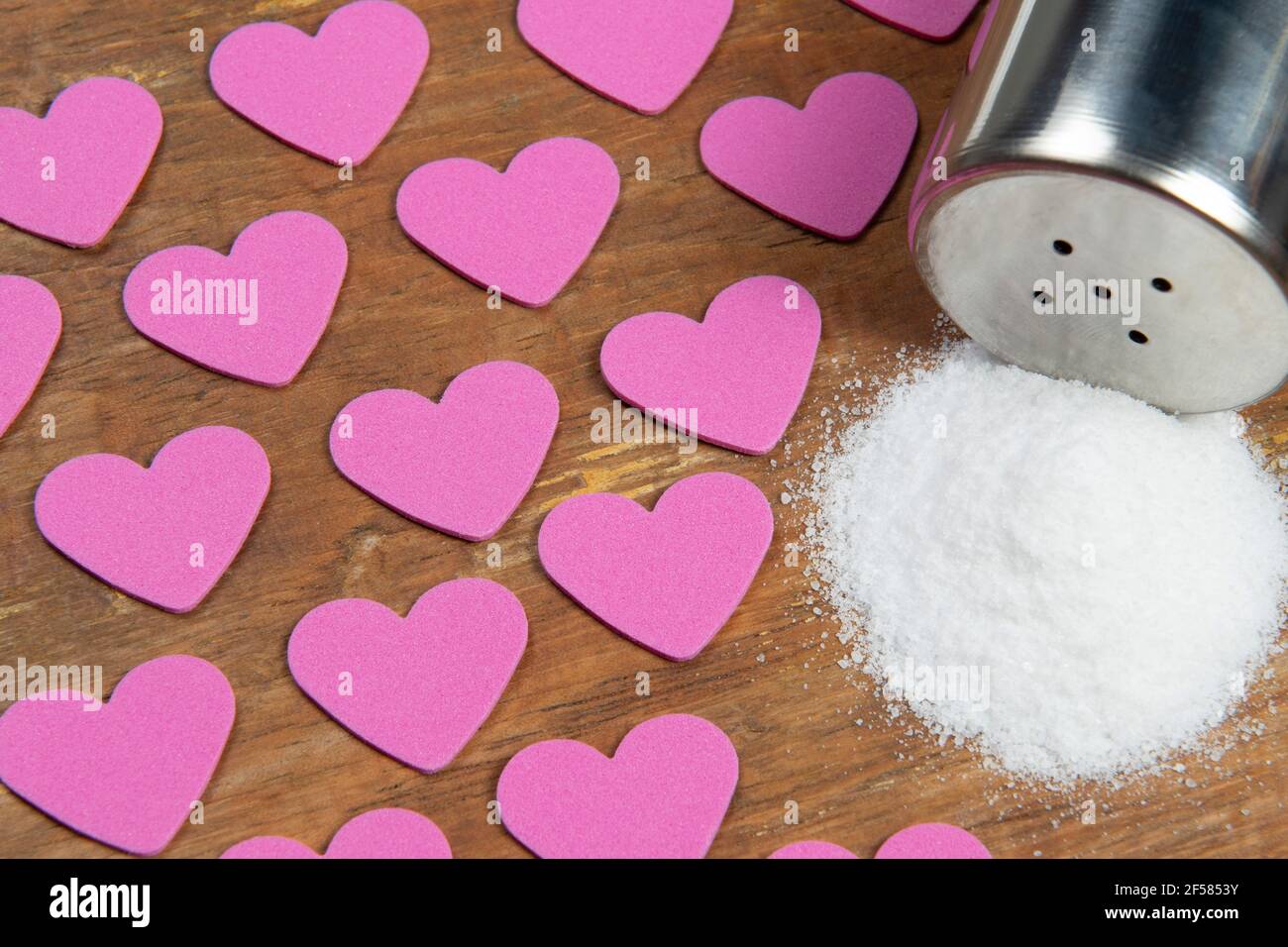 Salt causing high blood pressure and heart comorbidities Stock Photo