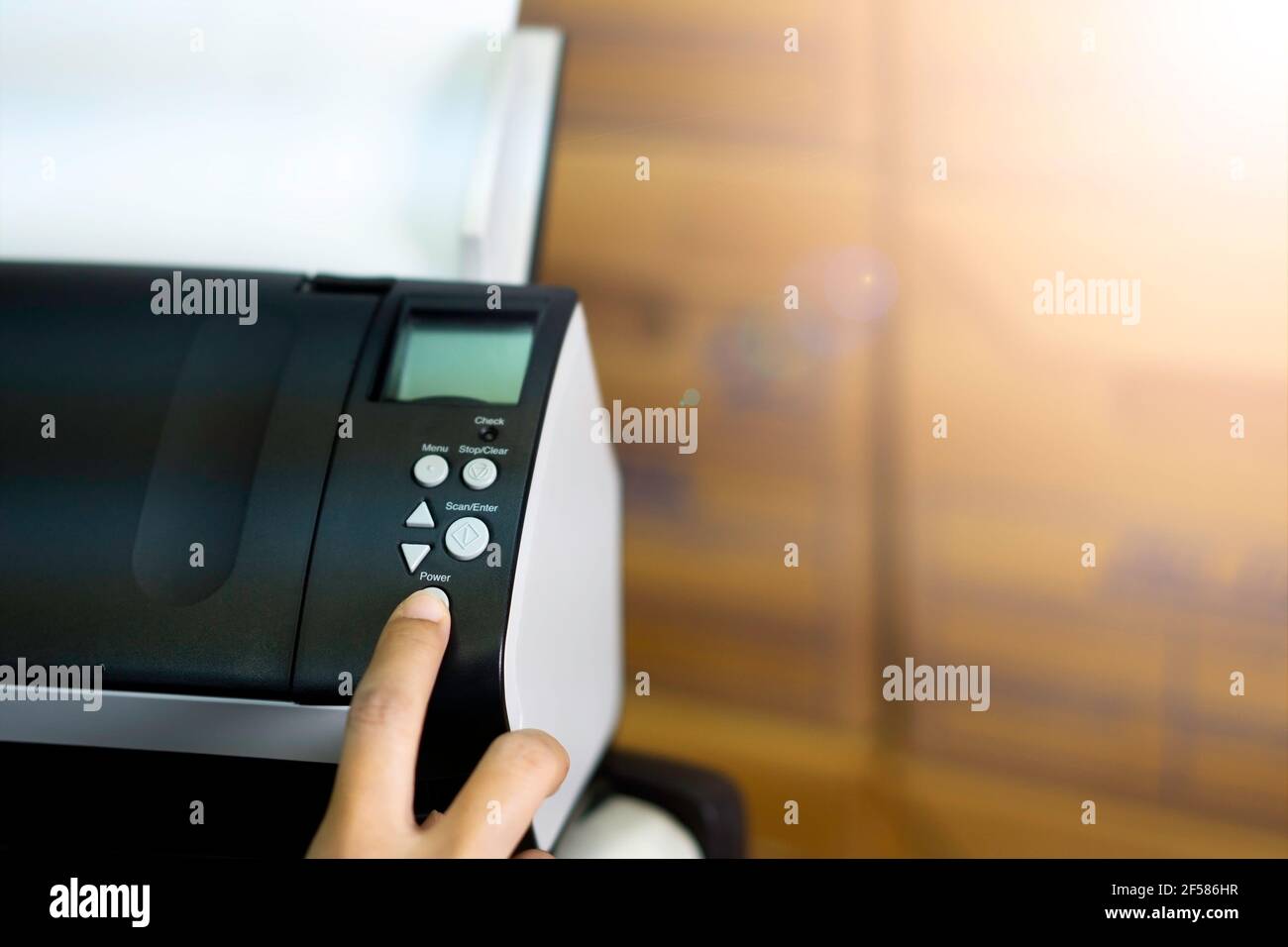 Hand of woman are scanning documents, storing data into the computer