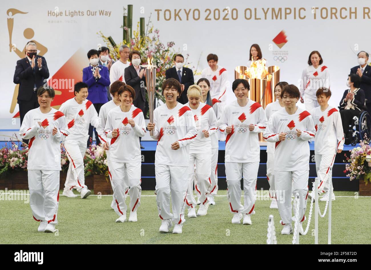 Fukishima Japan 25th Mar 21 Members Of The 11 Women S World Cup Winning Japan Soccer Team Run At The Start Of The Tokyo Olympic Torch Relay At The J Village Soccer Training Center In