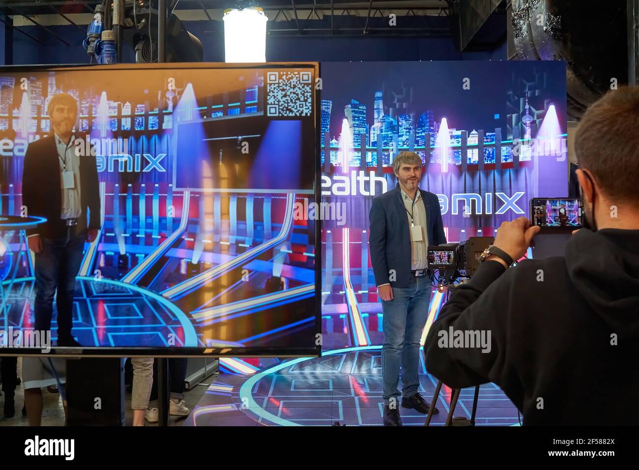 Moscow, Russia. 24th Mar, 2021. Live broadcast from a virtual studio during  the 17th International Exhibition of Equipment, Services and New  Technologies for Film and Television Production CPS 2021 in Moscow.The  largest