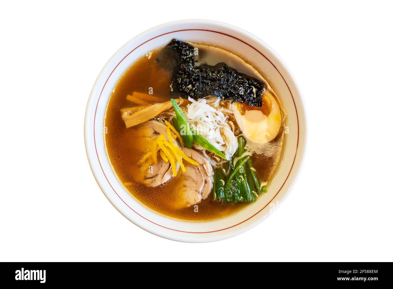 Ramen chicken soup with egg and bamboo shoots in a bowl on isolated