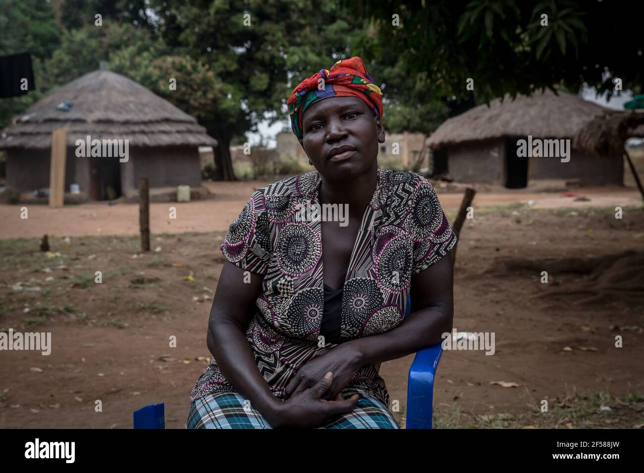 Gulu, Uganda. 04th Feb, 2021. Beatrice Amono, 42, whose brother and uncle were killed in the 2004 Lukodi massacre, seen in Lukodi village. Dominic Ongwen was convicted on 61 counts of war crimes and crimes against humanity on February 4, 2021. His case was controversial, as he was a former child soldier who rose the ranks of the Lord's Resistance Army to become one of its top commanders. (Photo by Sally Hayden/SOPA Images/Sipa USA) Credit: Sipa USA/Alamy Live News Stock Photo