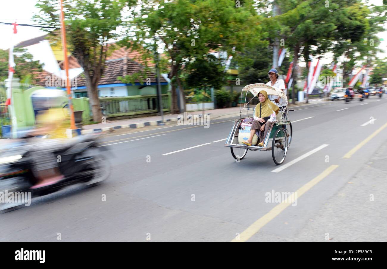 Cycle rickshaw in Banyuwangi, Java, Indonesia. Stock Photo