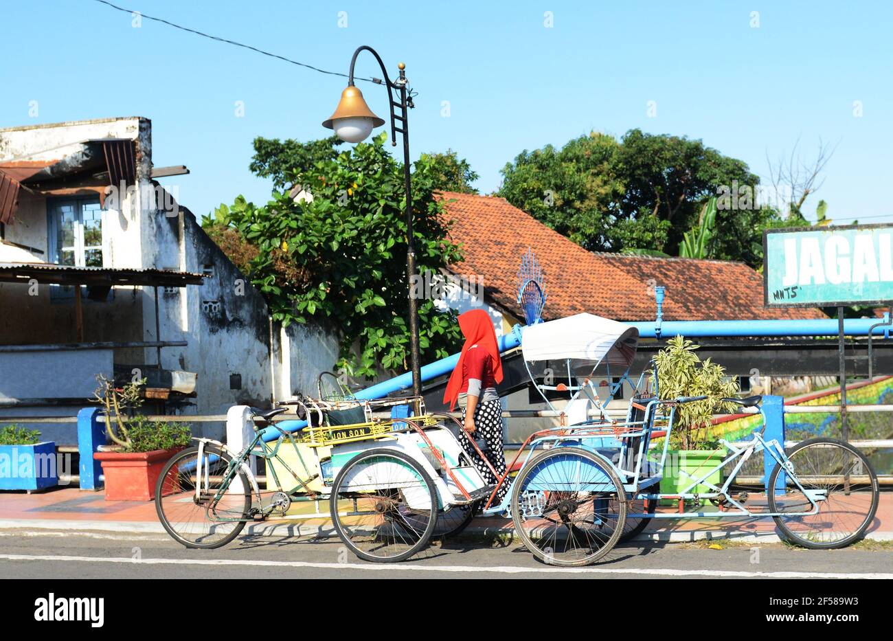 Cycle rickshaws in Banyuwangi, Java, Indonesia. Stock Photo