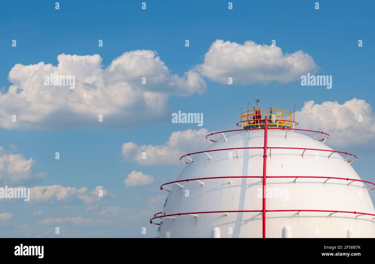 Industrial gas storage tank. LNG or liquefied natural gas storage tank. Spherical Gas reservoirs in petroleum refinery. Above-ground storage tank. Stock Photo