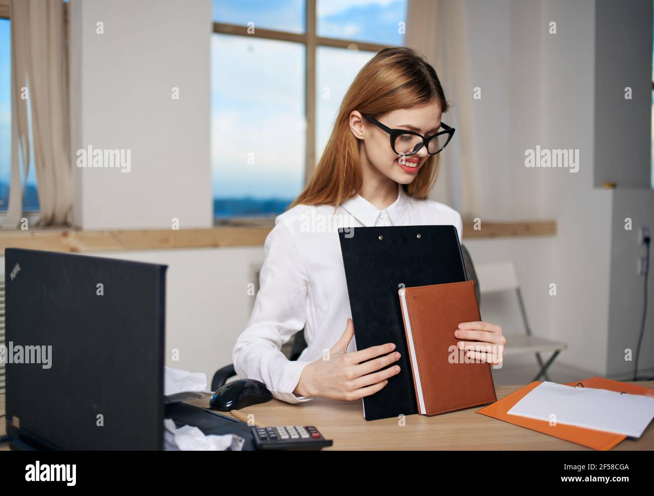 Business woman in white shirt at work tables documents office official ...