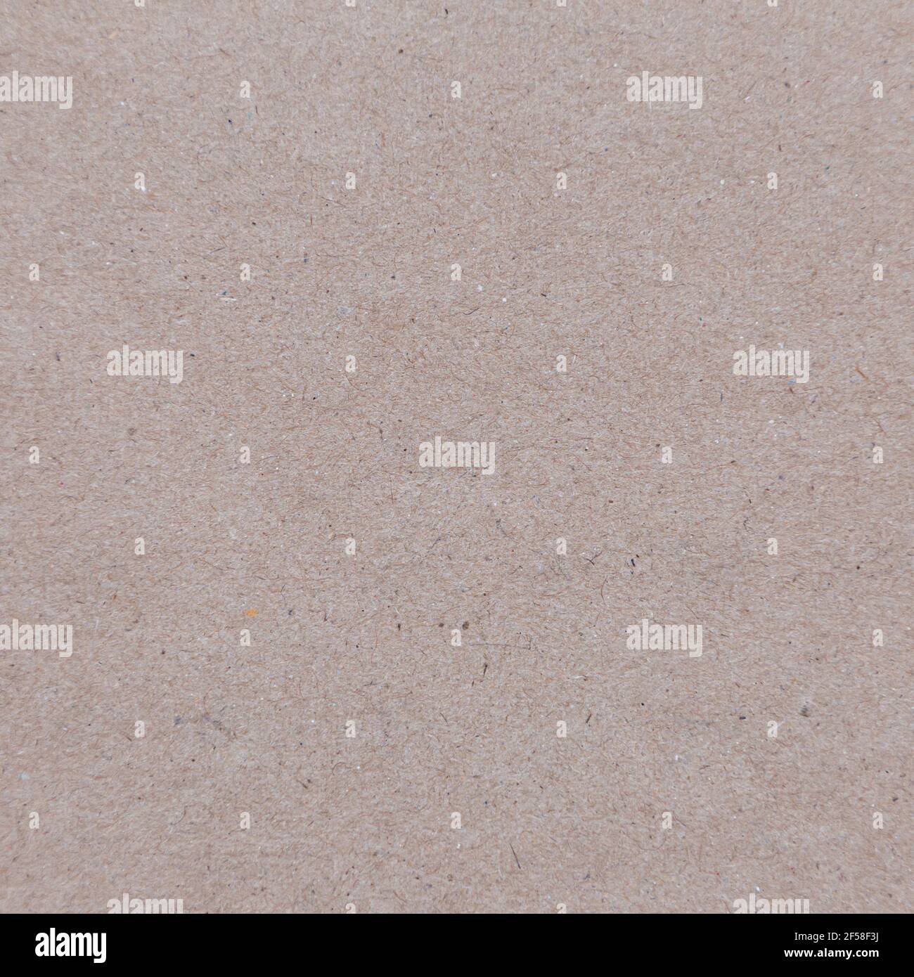 Close up of recycled brown paper texture for background design Stock Photo