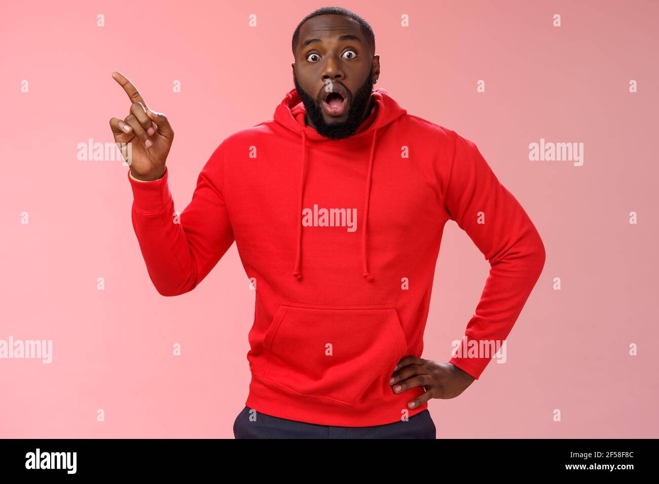 Shocked astonished black bearded young guy drop jaw gasping speechless