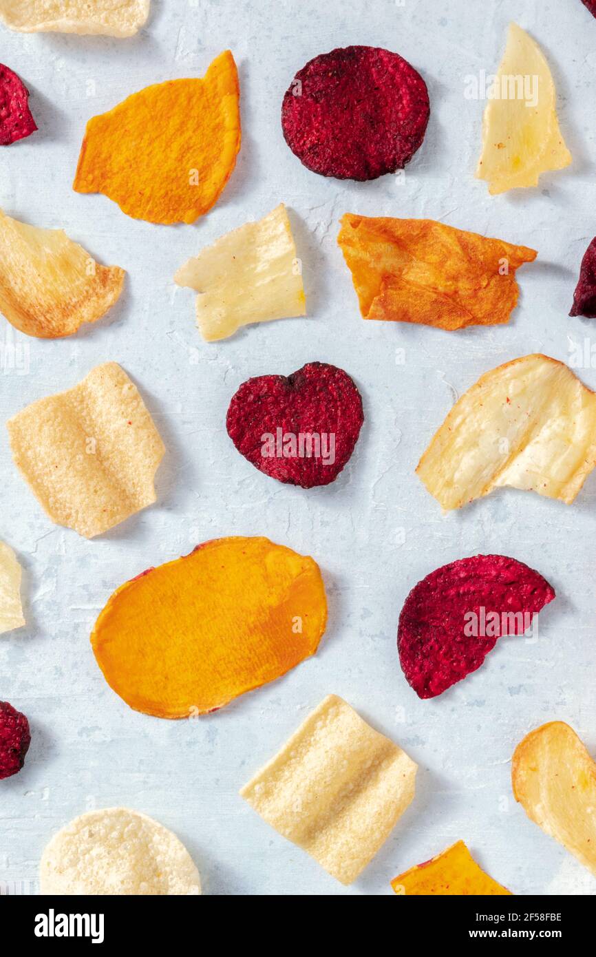 Fruit and vegetable chips pattern, overhead flat lay shot Stock Photo