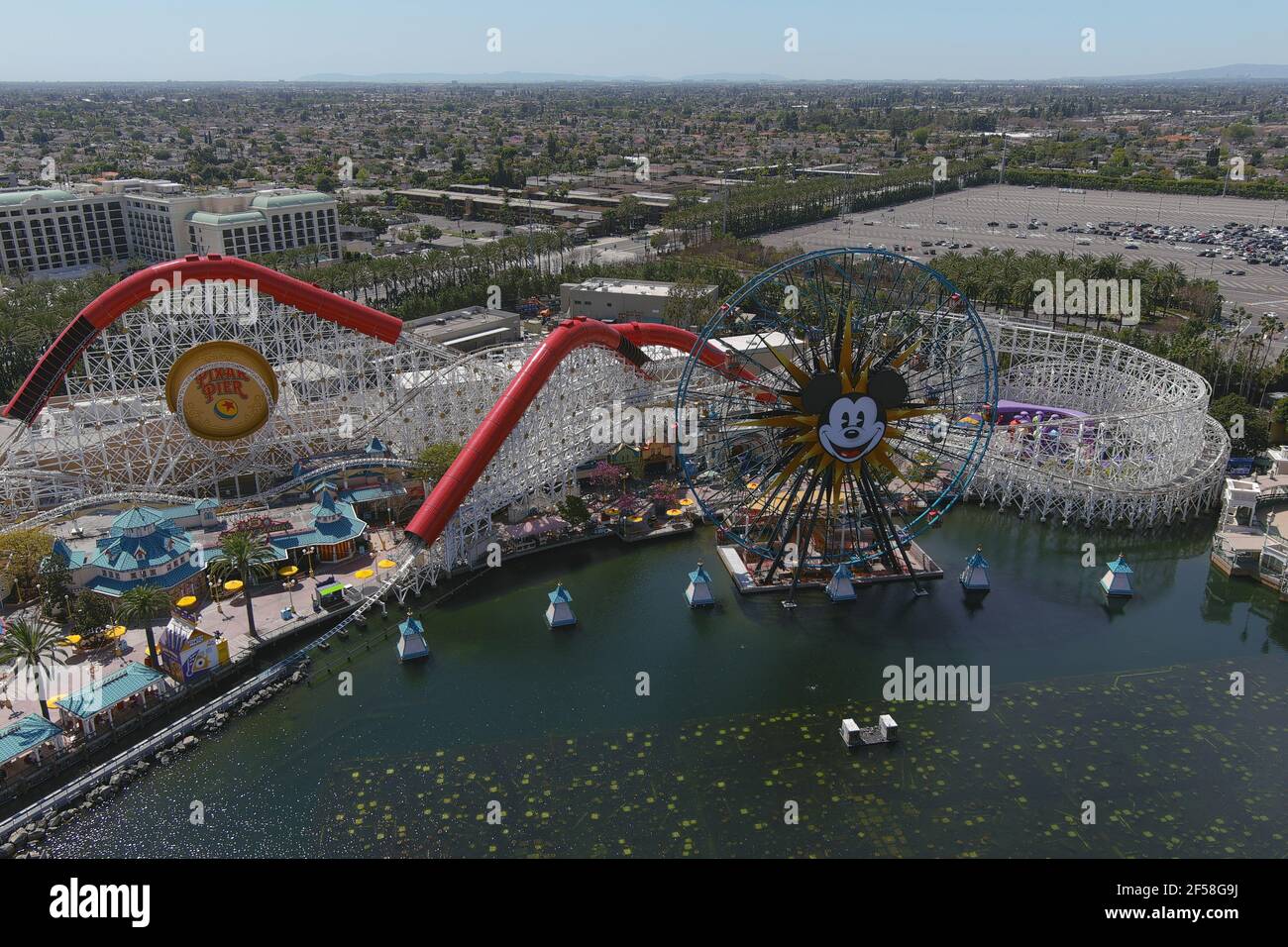 An aerial view of Mickey's Fun Wheel and the Indricoaster roller coaster ride at Disney California Adventure Park, Wednesday, March 24, 2021, in Anahe Stock Photo