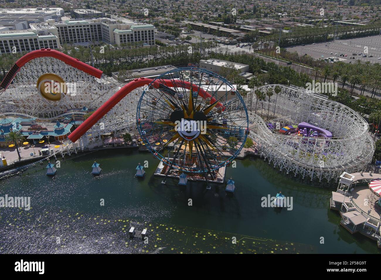 An aerial view of Mickey's Fun Wheel and the Indricoaster roller coaster ride at Disney California Adventure Park, Wednesday, March 24, 2021, in Anahe Stock Photo