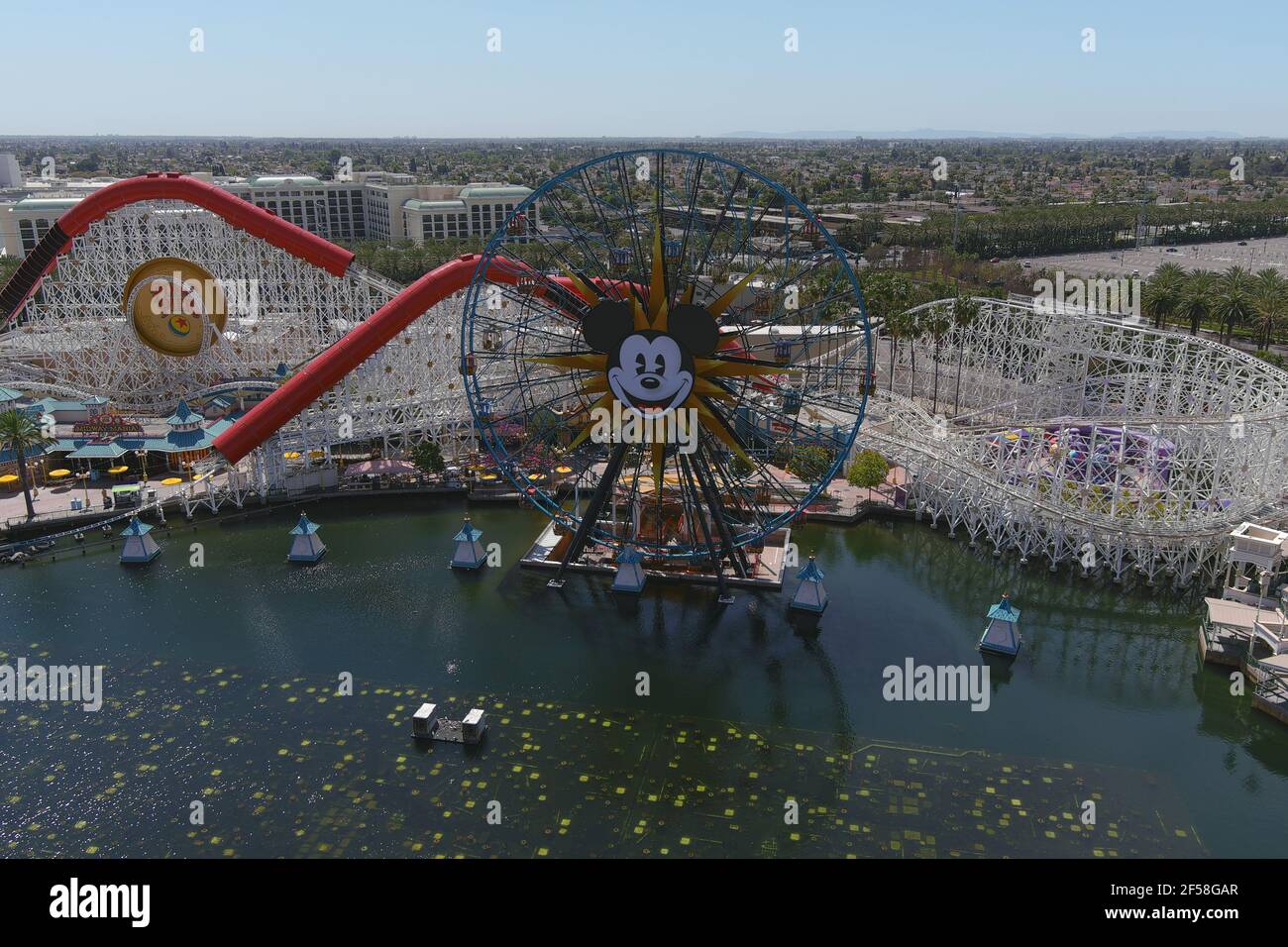 An aerial view of Mickey's Fun Wheel and the Indricoaster roller coaster ride at Disney California Adventure Park, Wednesday, March 24, 2021, in Anahe Stock Photo