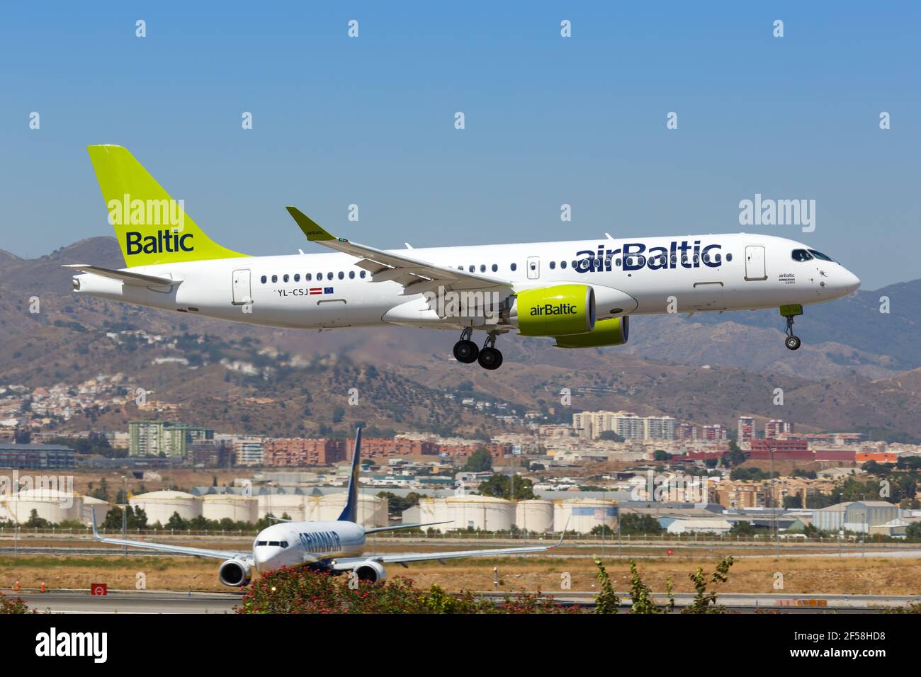 Malaga, Spain - July 28, 2018: Air Baltic Airbus A220 CSeries airplane at Malaga airport in Spain. Airbus is a European aircraft manufacturer based in Stock Photo