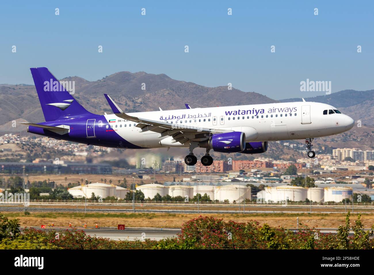 Malaga, Spain - July 28, 2018: Wataniya Airways Airbus A320 airplane at Malaga airport in Spain. Airbus is a European aircraft manufacturer based in T Stock Photo