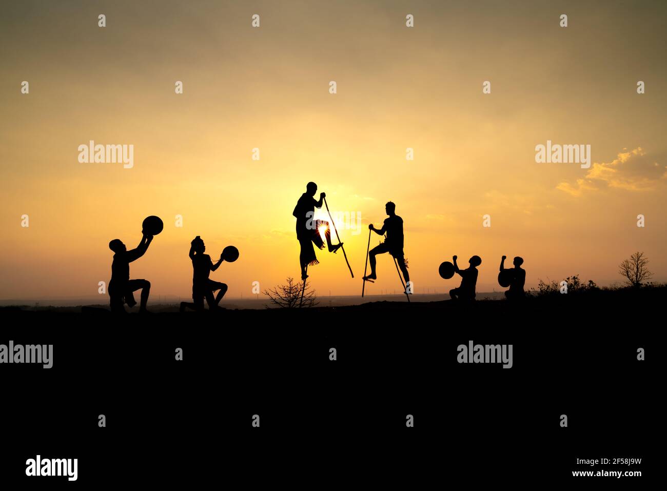 Pleiku Town, Gia Lai Province, Vietnam - March 6, 2021: Ede boys and girls perform their traditional dance during their sunset period in Pleiku town, Stock Photo