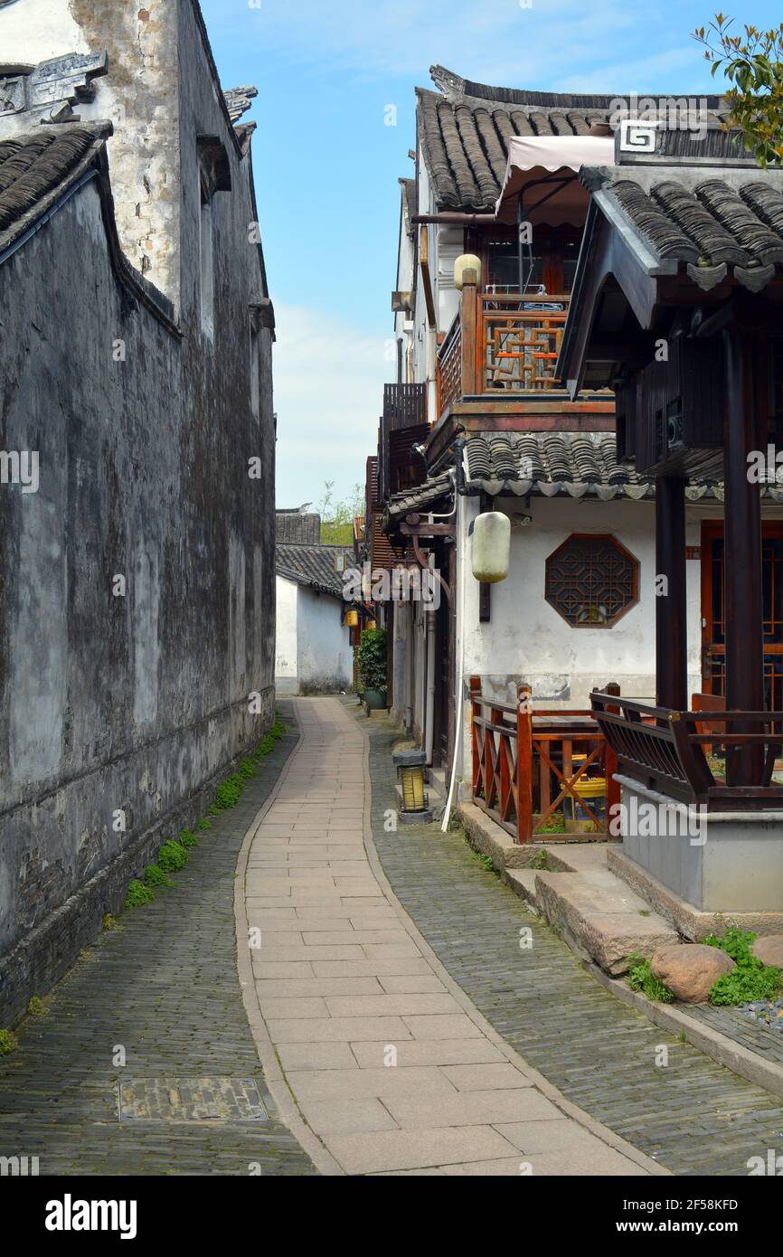 Side street in the Chinese scenic area of Zhouzhuang. Modernised but still with some of its ancient and historical past to keep the character. Stock Photo