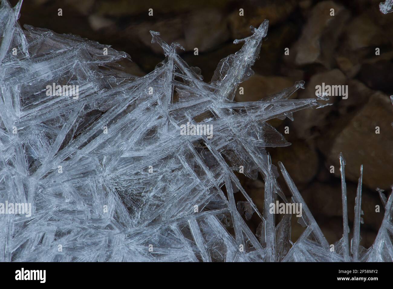 Ice spike crystal structure over rocks Stock Photo Alamy
