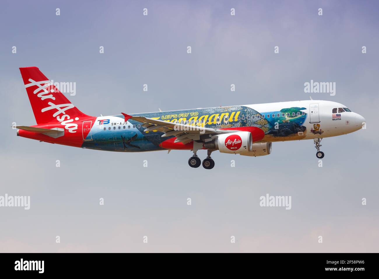 Kuala Lumpur, Malaysia – January 21, 2018: Air Asia Airbus A320 in the Let’s Fly to Terengganu special livery at Kuala Lumpur airport (KUL) in Malaysi Stock Photo