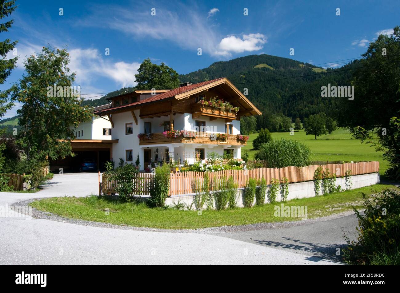 Beautiful Tyrolean House In The Village Of Soll In Austria Stock Photo