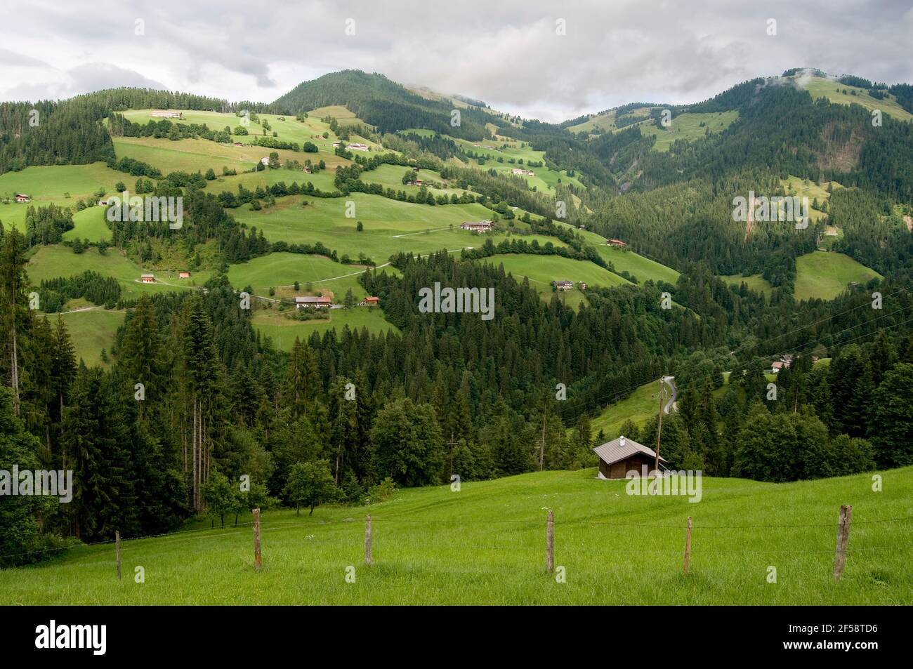 Looking Down On The Green Fields Near The Austrian Village Of Soll In Austria Stock Photo
