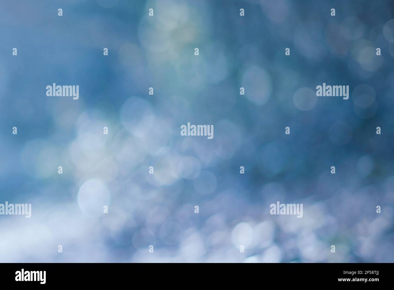 Abstract bokeh blur background with cold blue colors Stock Photo - Alamy