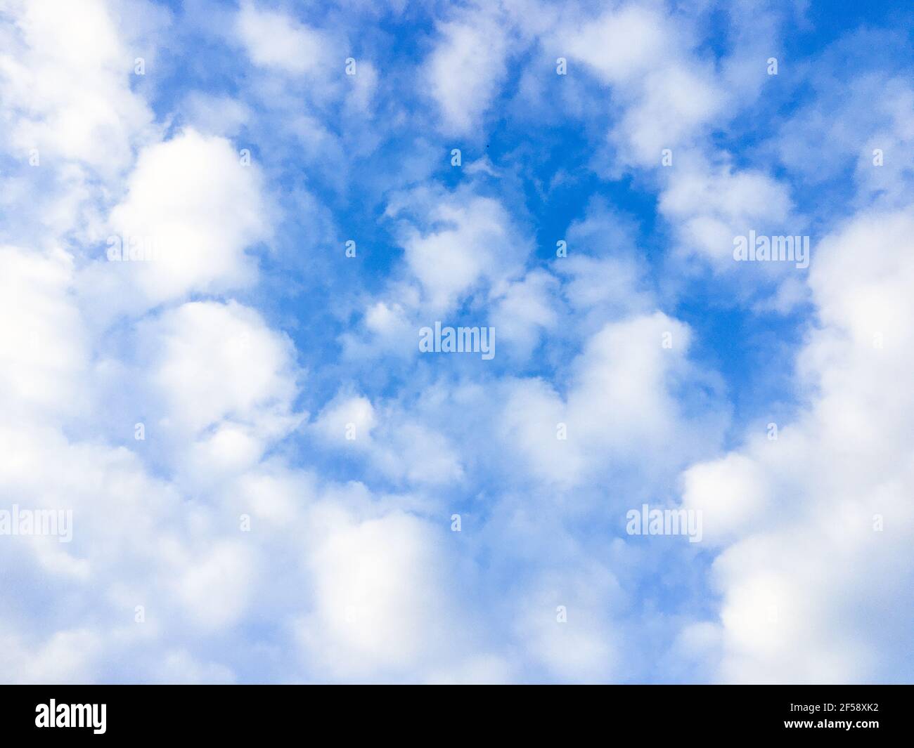 Clouds and blue sky with copy space background Stock Photo - Alamy