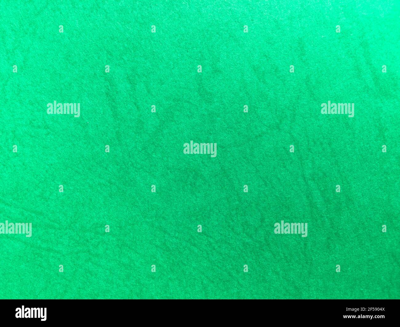 Green paper texture background with pattern for design. Copy space for text and work Stock Photo